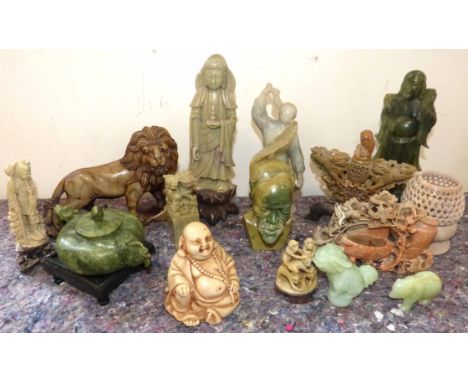A quantity of mixed jade and soapstone figures and ornaments Condition reports not available for this auction