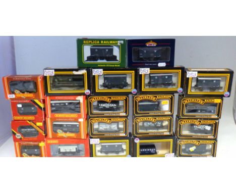 22 boxed Hornby, Mainline, Bachmann, Dapol and replica railways goods wagon Condition reports not available for this auction