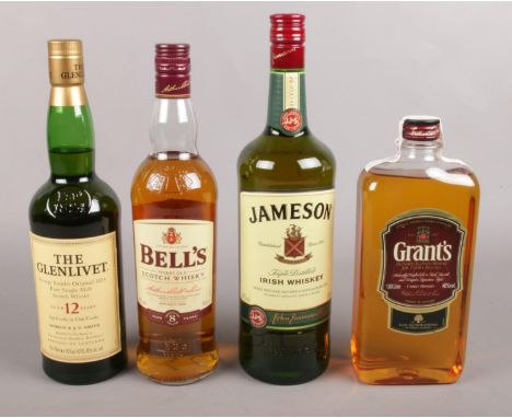 Four bottles of Scotch Whisky. Jameson triple distilled irish whisky, The Glenlivet single malt scotch whisky aged 12 years, 