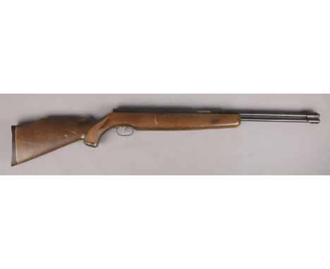 A Weihrauch HW 77 K .22cal air rifle. CAN NOT POST.  Cocks and fires with good power.