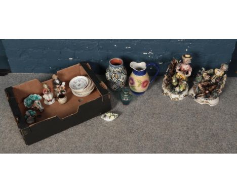 A box of miscellaneous. To include two capodimonte figures, assorted ceramic saucers and a Royal Doulton posy of flowers etc.