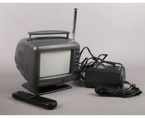 A Goodmans 6' colour TV/monitor. remote control, leads. Model No. C530.  