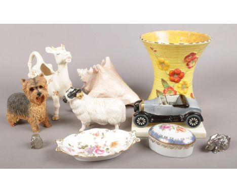 A quantity of mostly ceramics. Including Beswick ram, Beswick cow, Royal Crown Derby, Carltonware car, etc.  