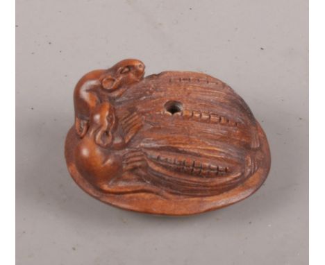 A carved hardwood Chinese netsuke. Two Rats eating corn. 3cm length.  