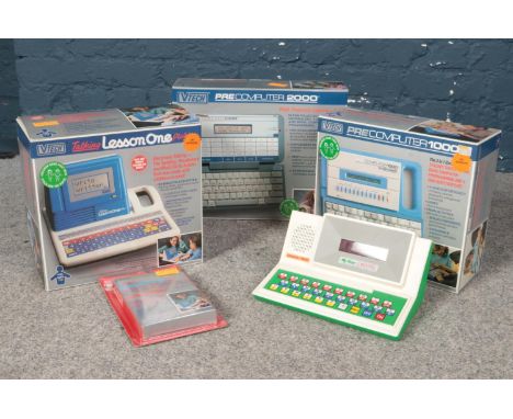 A collection of Children's computers. Grandstand My first computer, Vtech pre computer 2000 (boxed), Vtech pre computer 1000 