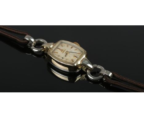 A ladies stainless steel Omega manual wristwatch.  Running.
