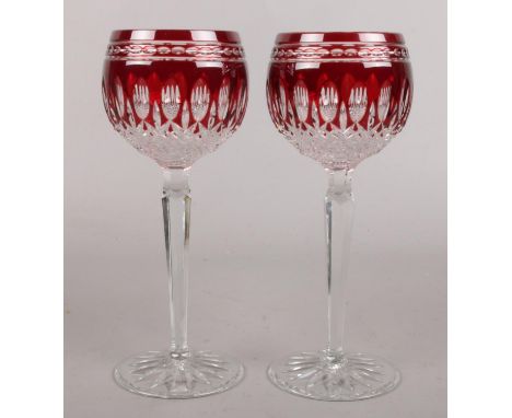 A pair of Waterford ruby flash hock glasses. 20cm.  Good condition.