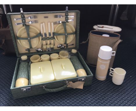 A Sirram picnic basket with a Brexton Collection Model No. SB/2 picnic bag.