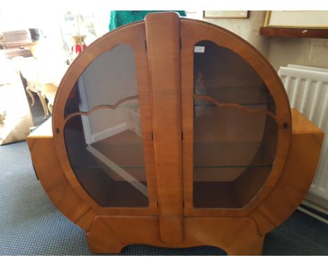 A walnut veneered glazed two door Art Deco style display cabinet.