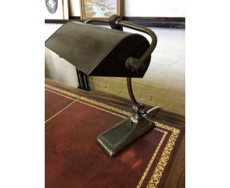 A bronze bankers desk lamp.