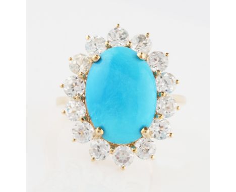 A turquoise and zircon cluster ring, hallmarked Sheffield, ring size V.