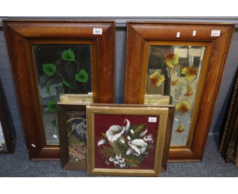 Pair of painted and cut glass bevel plate gypsy mirrors in deep oak frames, together with a beaded floral panel and a framed 