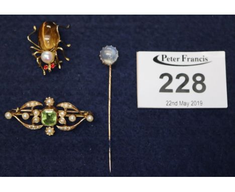 Opal stick pin, pearl and peridot 15ct gold brooch and a spider brooch.(B.P. 24% incl. VAT)  CONDITION REPORT: All three item