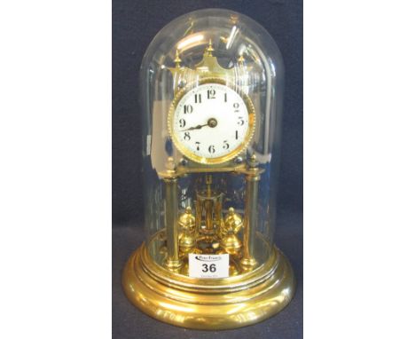 20th century brass frame, hundred day perpetual motion dome clock with enamel face and glass dome. 27 cm high approx.(B.P. 24