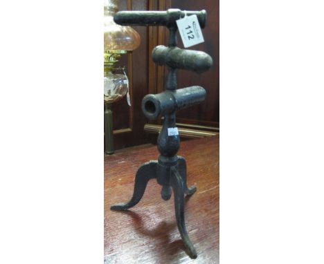 Unusual Victorian cast iron three section tripod gophering iron stand. 36 cm high approx.(B.P. 24% incl. VAT) CONDITION REPOR
