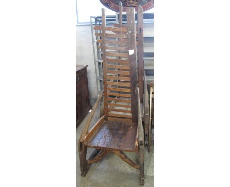 Pair of possibly Malaysian hardwood, high ladder back, rustic open arm chairs. Water damaged. No estimate, no reserve.(B.P. 2