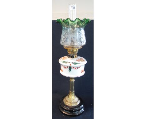 Early 20th century brass double burner oil lamp with ceramic reservoir on brass pedestal and ceramic base, coloured etched gl