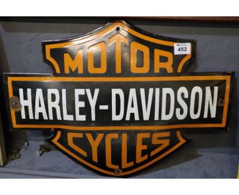 Steel plate enamel advertising sign, single sided of convex form for Harley-Davidson Motorcycles. 55 cm wide approx.(B.P. 24%