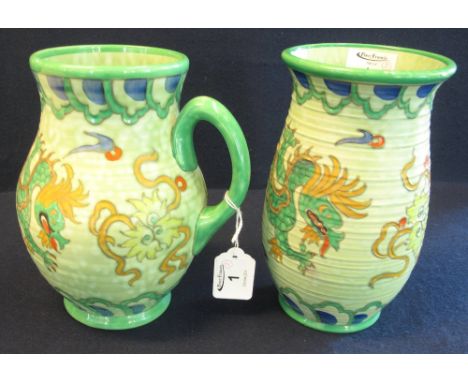 Two similar crown ducal Charlotte Rhead design pottery items: a baluster-shaped jug and a baluster-shaped vase with similar t