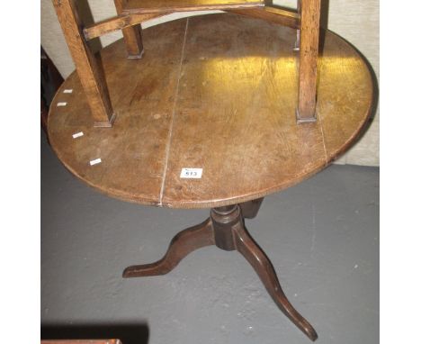 19th century oak tilt-top circular tripod table.(B.P. 24% incl. VAT)