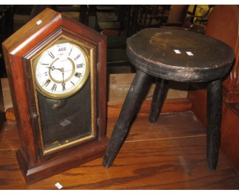 Rustic stained milking stool together with and architectural two-train mantel clock. (2)(B.P. 24% incl. VAT) 