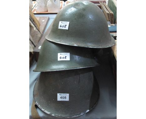 Three post-war British army helmets. (3)(B.P. 24% incl. VAT)
