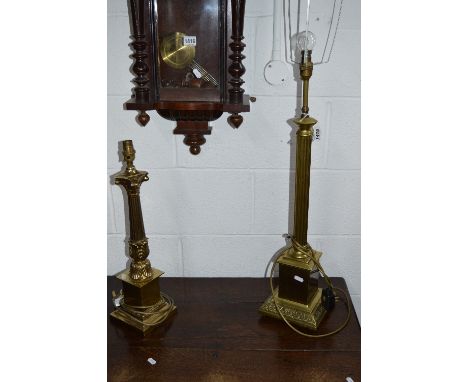 A BRASS COLUMN STYLE TABLE LAMP, another brass table lamp and two framed pictures (4)