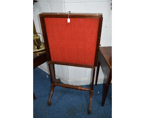 A VICTORIAN MAHOGANY FIRE SCREEN, with triple pull out sections to the sides and top on a turned stretchered base and scrolle