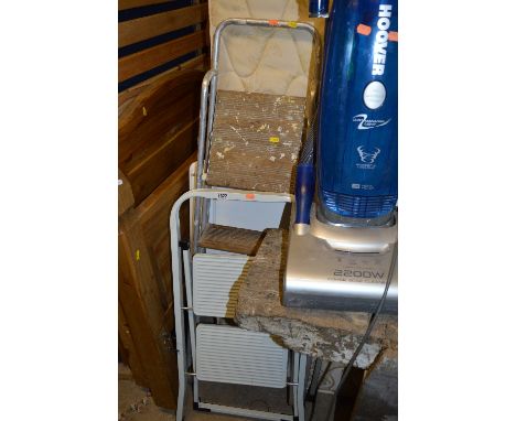 FOUR SETS OF STEP LADDERS
