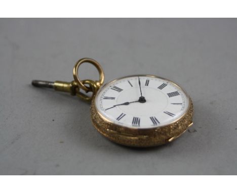 A LATE VICTORIAN SMALL POCKET WATCH, measuring approximately 39mm in diameter, fully engraved in a fancy floral and engine tu