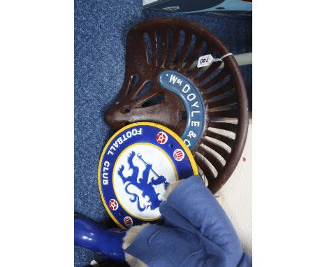 A WM DOYLE & CO LTD CAST IRON TRACTOR SEAT, repainted, with a recent painted cast iron Chelsea F.C wall plaque (2)