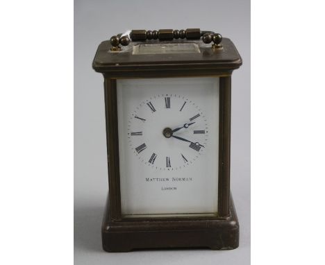 A MATTHEW NORMAN CARRIAGE CLOCK (key), height 10.5cm