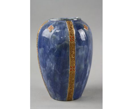 A ROYAL DOULTON STONEWARE BALUSTER VASE, enamel flowers and a gilt banding on blue ground, impressed backstamp and 8565A, UBW