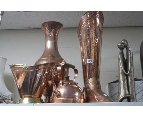 FOUR PIECES OF 20TH CENTURY COPPER, comprising a kettle, a scuttle shaped flower arranging vase, a ewer and a boot shaped sti