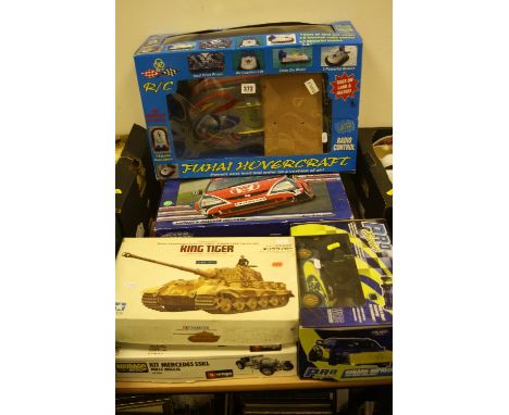 A COLLECTION OF TWO RADIO CONTROLLED CARS, 1 x Honda Civic, 1:11 scale and 1 x Subaru Pro Sport. Also in this Lot is a Fuhai 