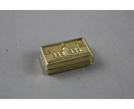A GEORGE IV SILVER GILT 'CASTLE TOP' VINAIGRETTE OF RECTANGULAR FORM WITH A LOW RELIEF VIEW OF BRIGHTON PAVILION, by John Law