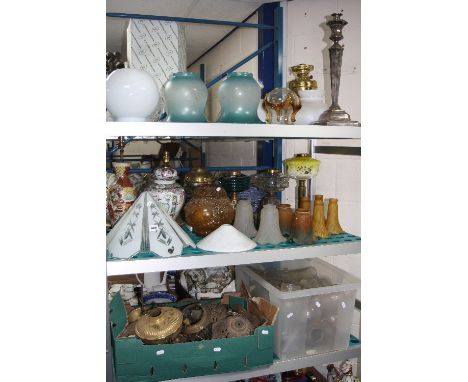 A LARGE COLLECTION OF VICTORIAN AND LATER OIL LAMPS AND PARTS, SHADES, FUNNELS, TABLE LAMPS, etc, to include silver plate on 