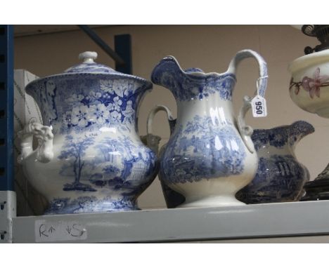 THREE VICTORIAN BLUE AND WHITE JUGS, all printed with scenes of castles and ruins, one impressed J.T. Wileman, together with 
