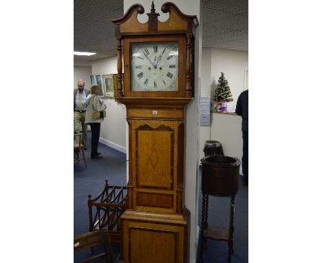 AN EARLY 19TH CENTURY OAK, WALNUT AND MAHOGANY BANDED LONGCASE CLOCK, broken swan neck pediment supported on turned columns, 