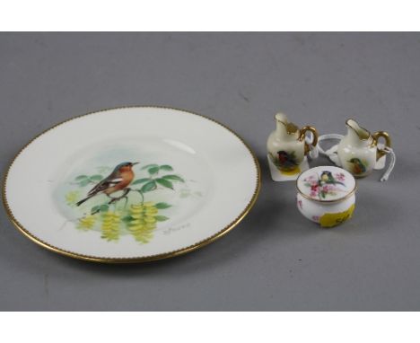 FOUR PIECES OF ROYAL WORCESTER, decorated with birds, to include plate 'Chaffinch' signed W. Powell, diameter approximately 1