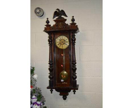 A LATE 19TH CENTURY WALNUT AND EBONISED VIENNA REGULATOR WALL CLOCK, Eagle surmount to pediment flanked by turned finials, ci