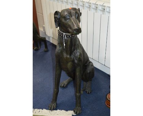 A RESIN MODEL OF A SEATED GREYHOUND, approximate height 80cm