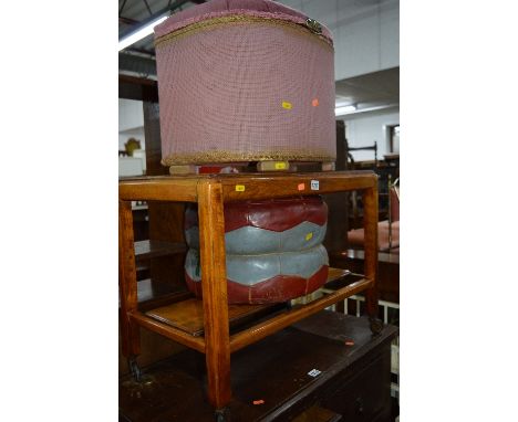 AN OAK TEA TROLLEY, leather pouffe, linen basket, drop leaf occasional table and a dolls rocking crib (5)