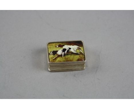 AN ENAMEL BOX OF TWO DOGS, marked Sterling