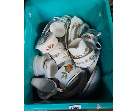 A crate containing a quantity of ceramics including Royal Standard teaware, Royal Worcester Evesham, etc.