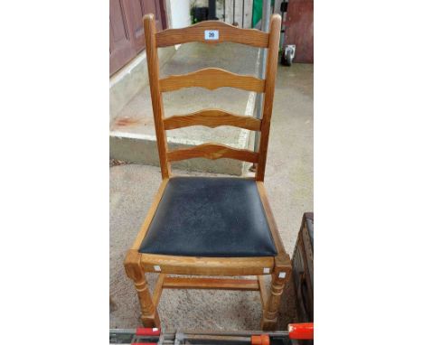 A pine ladder back chair