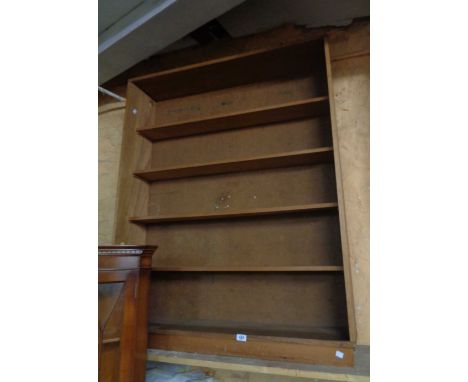 A 1.07m modern mixed wood five shelf open bookcase, set on plinth base