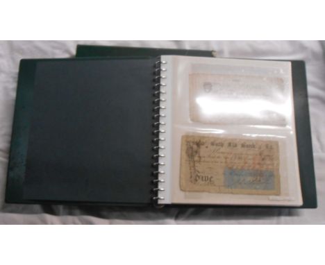 A box sleeved ring bound album containing a collection a plastic sleeve mounted antique and vintage banknotes including early
