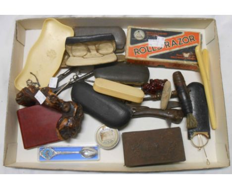 A tray of collectables including corkscrew, an old razor, various cased spectacles, etc.