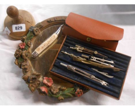 A vintage Barbola mirror (a/f) - sold with a pocketknife, a butter stamp, etc.